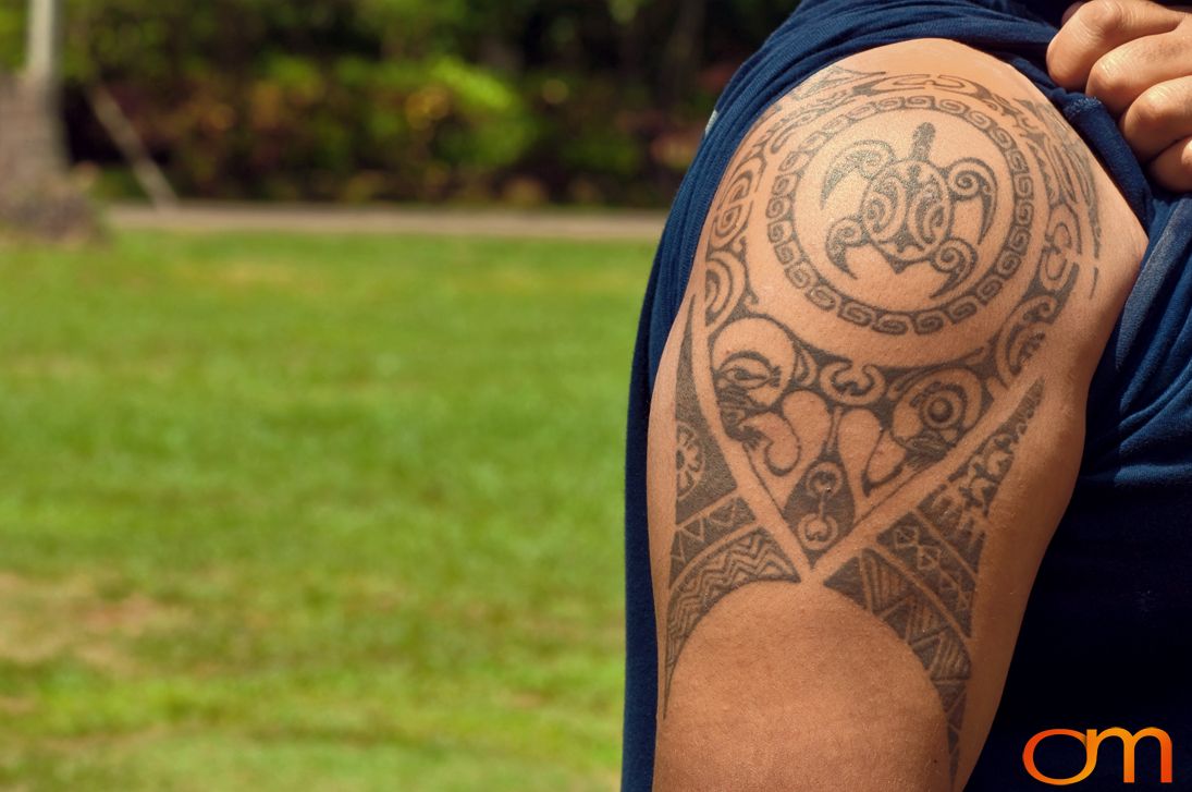 Photo of Cook Islands traditional tattoo on a man's arm and shoulder. Taken by Amanda Fornal in October 2006.