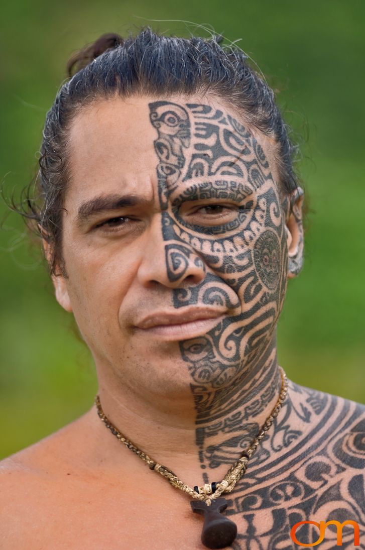 Photo of Polynesian traditional tattoos on a man's face. Taken of Tihoti on the island of Huahine by Amanda Fornal in November 2006.