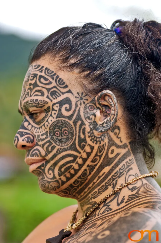 Photo of Polynesian traditional tattoos on a man's face. Taken of Tihoti on the island of Huahine by Amanda Fornal in November 2006.