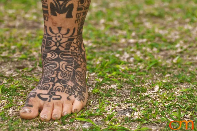 Photo of Polynesian traditional tattoos on a man's foot. Taken of Tihoti on the island of Huahine by Amanda Fornal in November 2006.