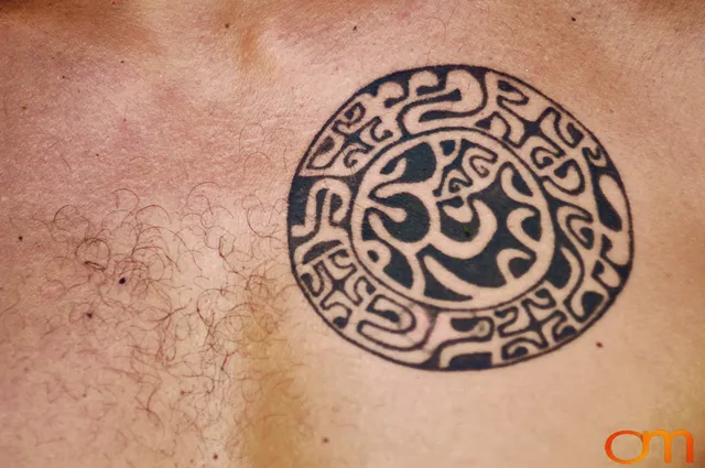 Photo of Polynesian traditional tattoo on a man's chest. Taken on the island of Huahine by Amanda Fornal in November 2006.