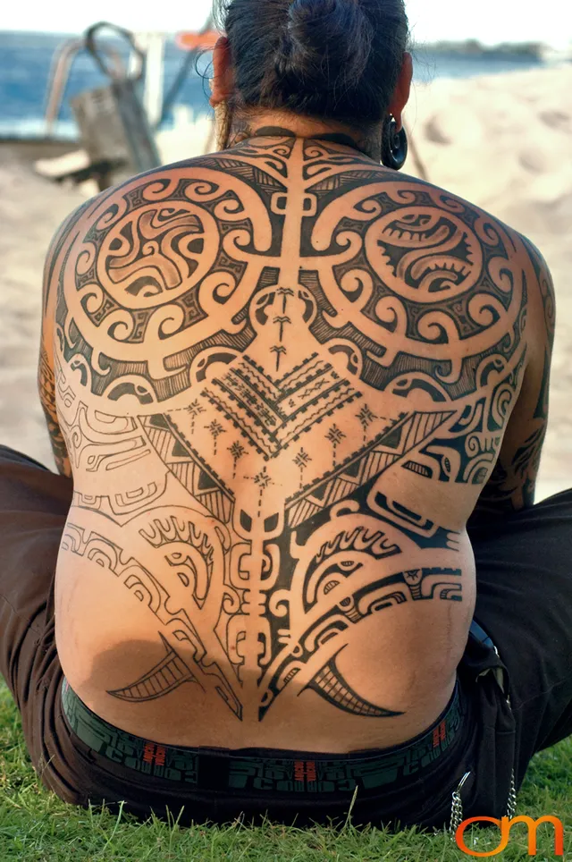 Photo of Polynesian traditional tattoo on a man's back. Taken at the 2006 Tattoonesia tattoo festival of Onu by Amanda Fornal in December 2006.