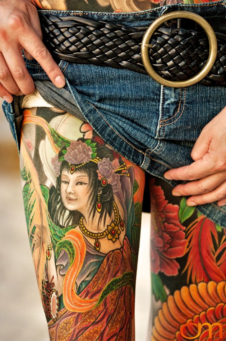 Photo of a Japanese bodysuit tattoo on a woman. Taken at the 2006 Tattoonesia tattoo festival of Yoko by Amanda Fornal in December 2006.