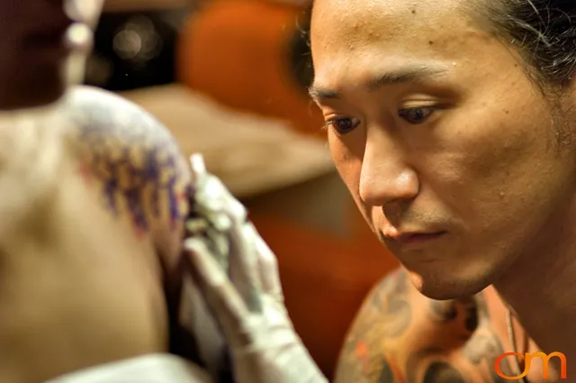 Photo of the Japanese tattoo artist Shige. Taken at the 2006 Tattoonesia tattoo festival by Amanda Fornal in December 2006.