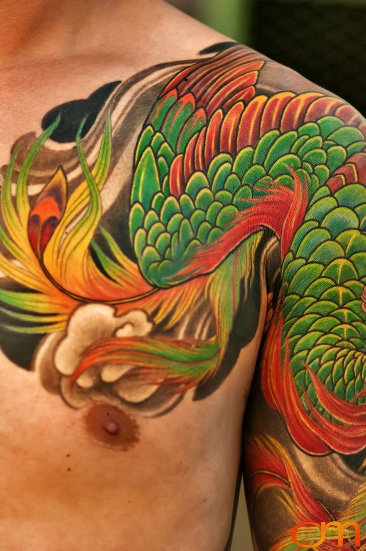 Photo of a Japanese bodysuit tattoo on a man. Taken at the 2006 Tattoonesia tattoo festival by Amanda Fornal in December 2006.