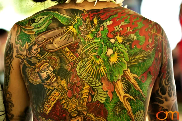 Photo of a Japanese back tattoo on a man. Taken at the 2006 Tattoonesia tattoo festival by Amanda Fornal in December 2006.