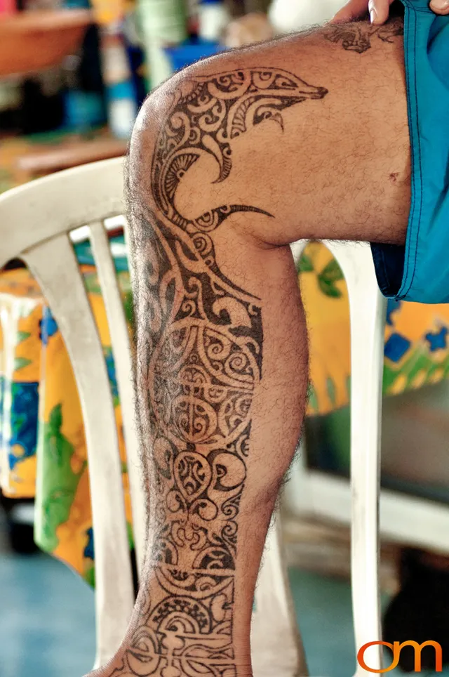 Photo of Polynesian traditional tattoos on a man's leg. Taken of Santos on the Marquesas island of Hiva Oa by Amanda Fornal in October 2006.