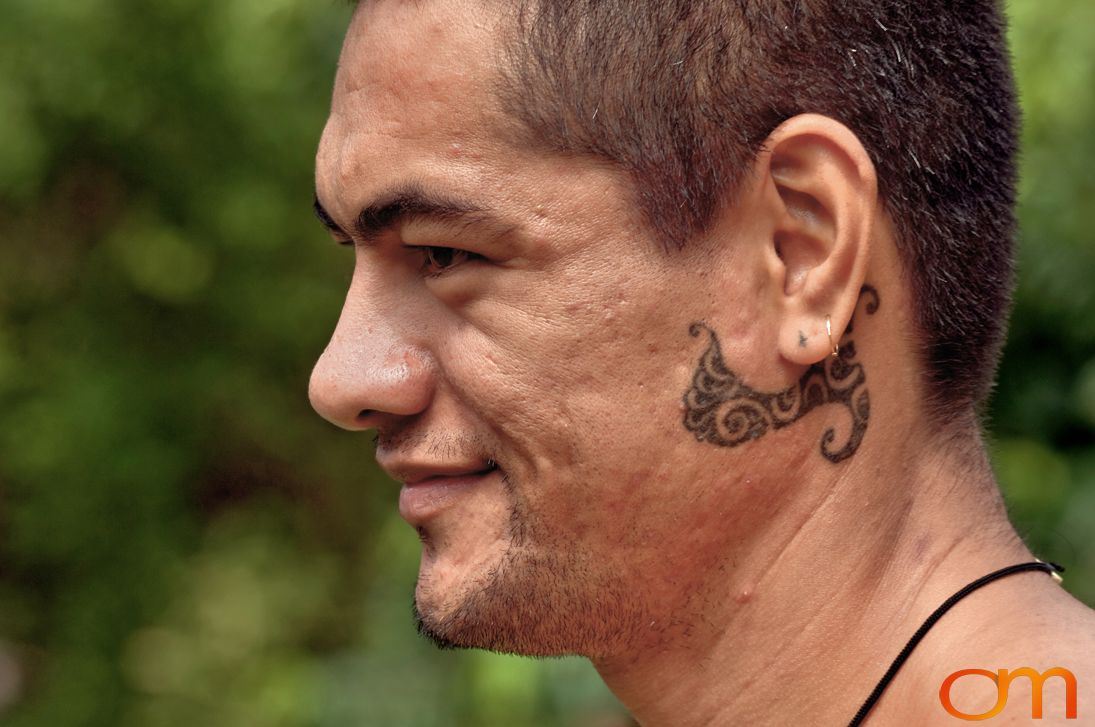 Photo of Polynesian traditional tattoo on a man's face. Taken of Santos on the Marquesas island of Hiva Oa by Amanda Fornal in October 2006.