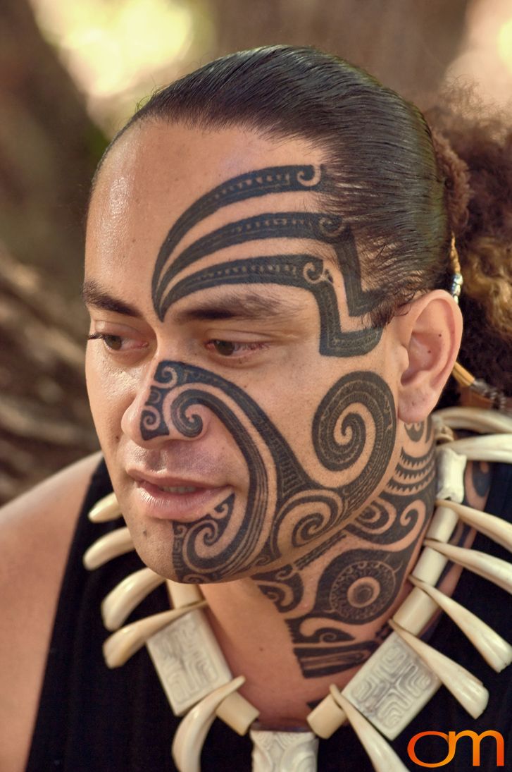 Photo of Polynesian traditional tattoo on a man's face. Taken of Jean Eve on the Marquesas island of Nuku Hiva by Amanda Fornal in October 2006.