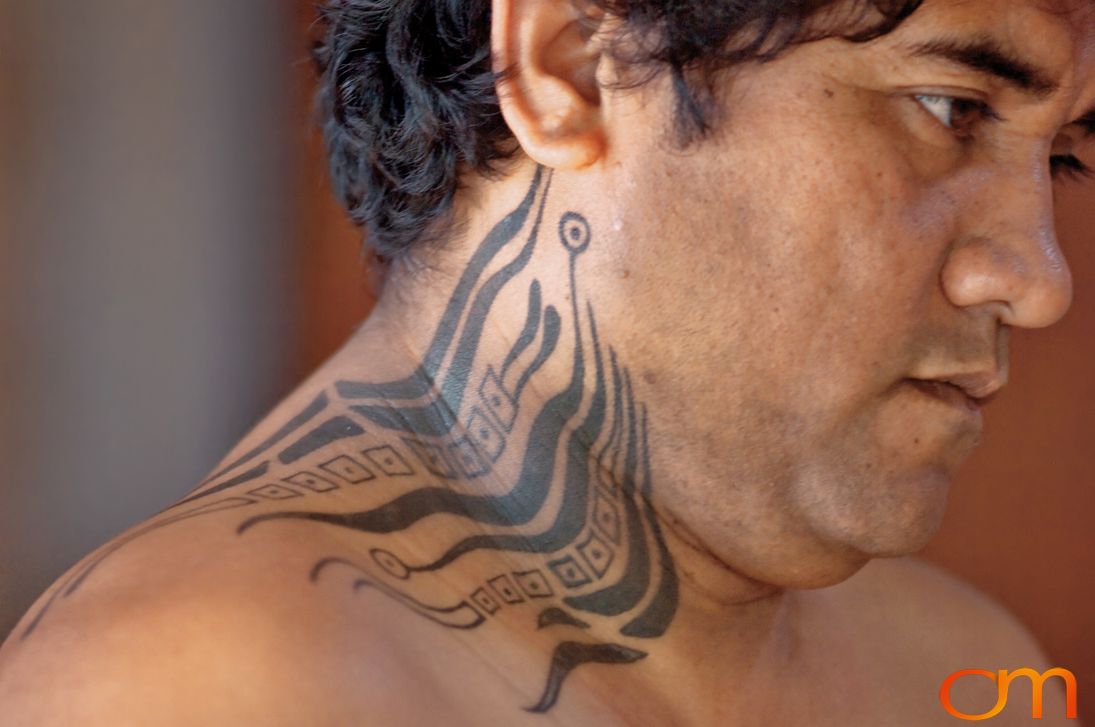 Photo of Rapa Nui (Easter Island) traditional tattoo on a man's neck. Taken of Julio by Amanda Fornal in December 2006.