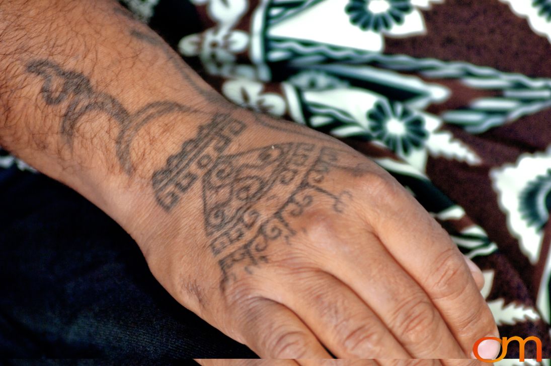 Photo of Rapa Nui (Easter Island) traditional tattoo on a man's hand. Taken of Julio by Amanda Fornal in December 2006.