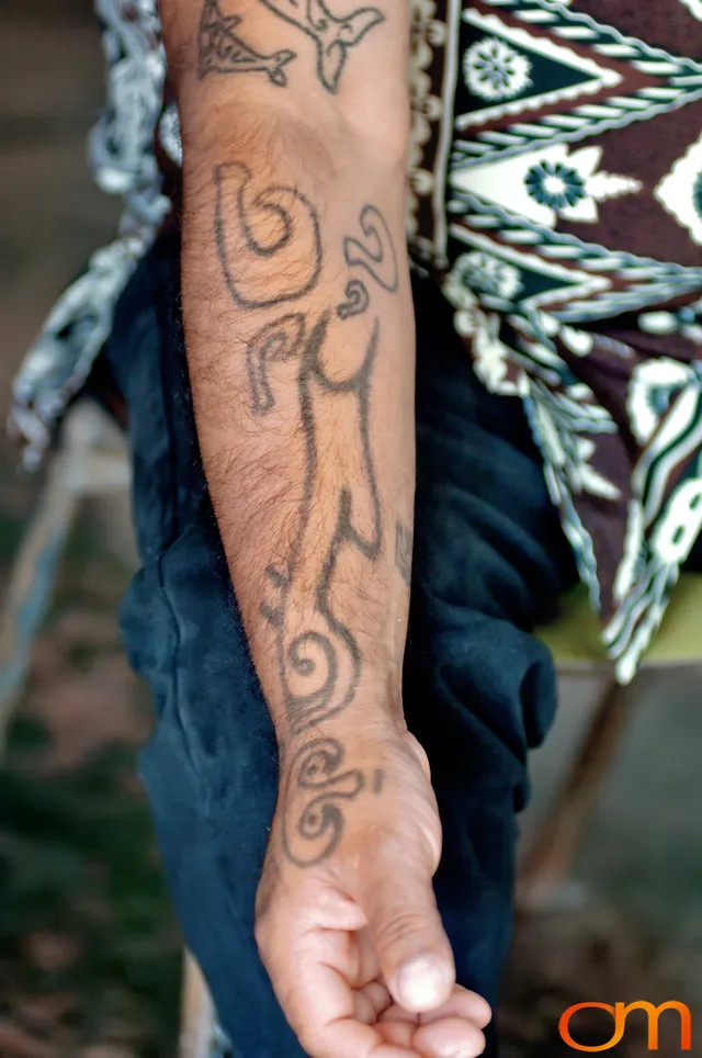 Photo of Rapa Nui (Easter Island) traditional tattoo on a man's arm. Taken of Julio by Amanda Fornal in December 2006.