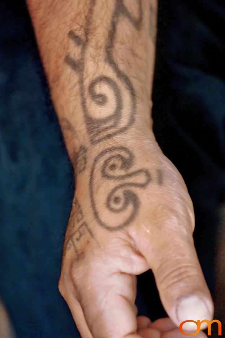 Photo of Rapa Nui (Easter Island) traditional tattoo on a man's hand. Taken of Julio by Amanda Fornal in December 2006.