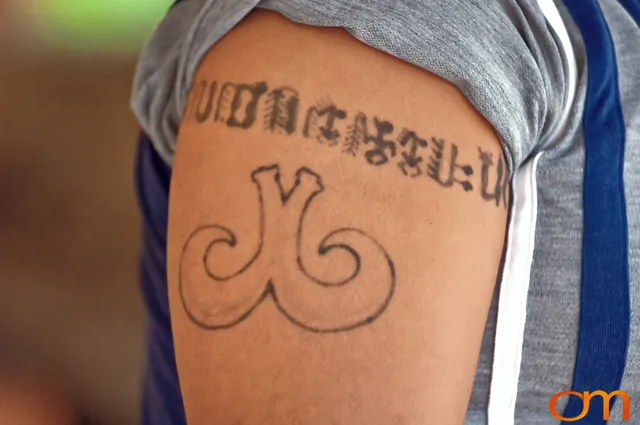 Photo of Rapa Nui (Easter Island) traditional tattoo on a man's arm. Taken by Amanda Fornal in December 2006.