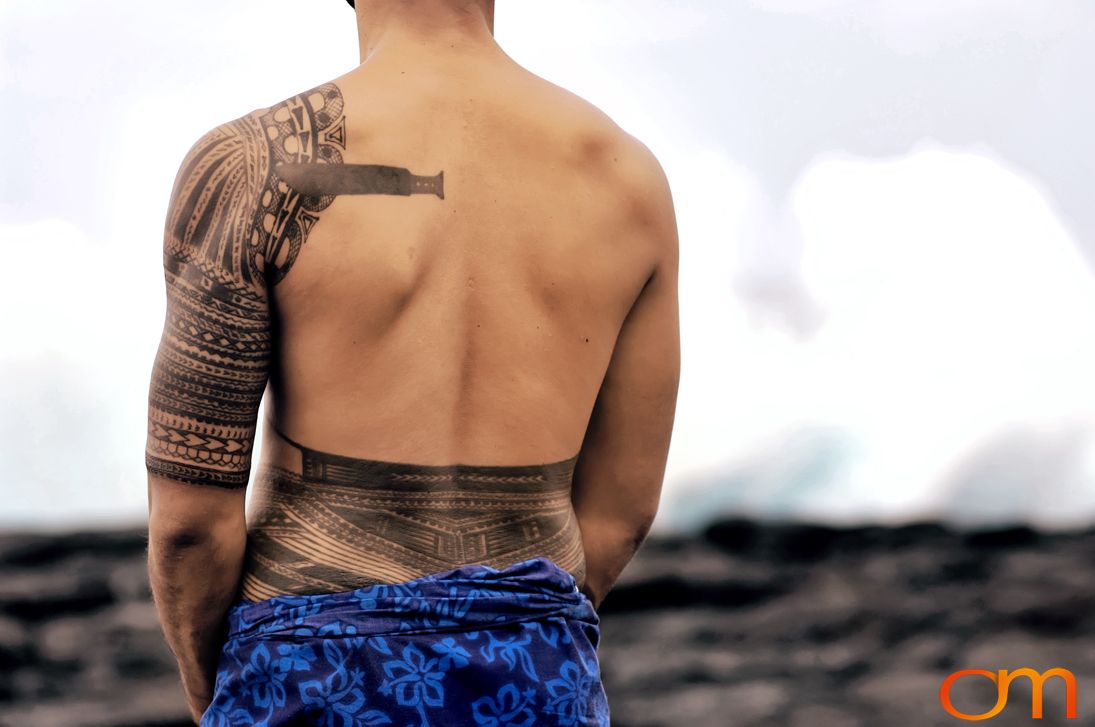 Photo of a man with traditional Samoan tattoos. Taken of Chris on the island of Savai’i by Amanda Fornal in September 2006.