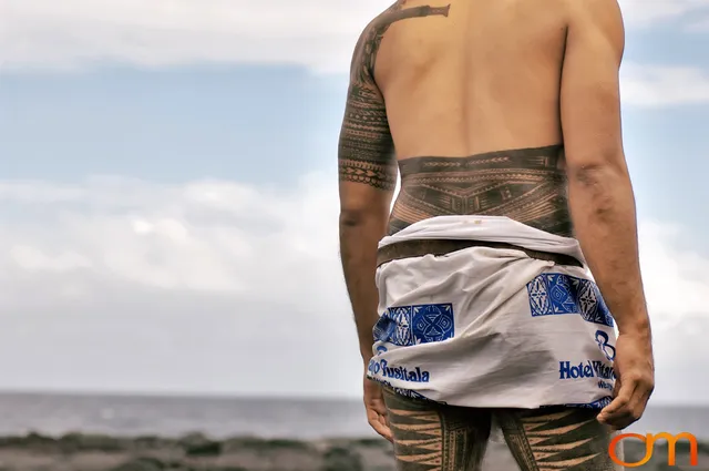 Photo of a man with traditional Samoan tattoos. Taken of Chris on the island of Savai’i by Amanda Fornal in September 2006.