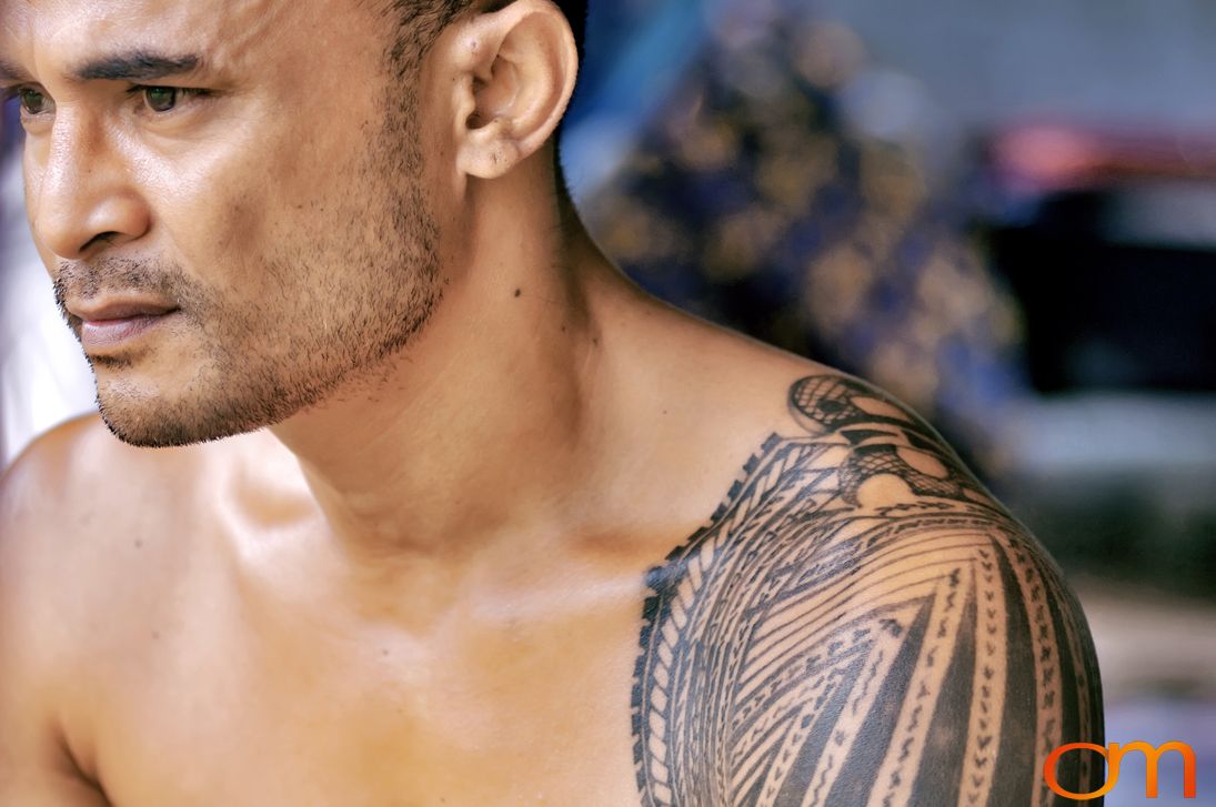 Photo of a man with traditional Samoan tattoos. Taken of Chris on the island of Savai’i by Amanda Fornal in September 2006.