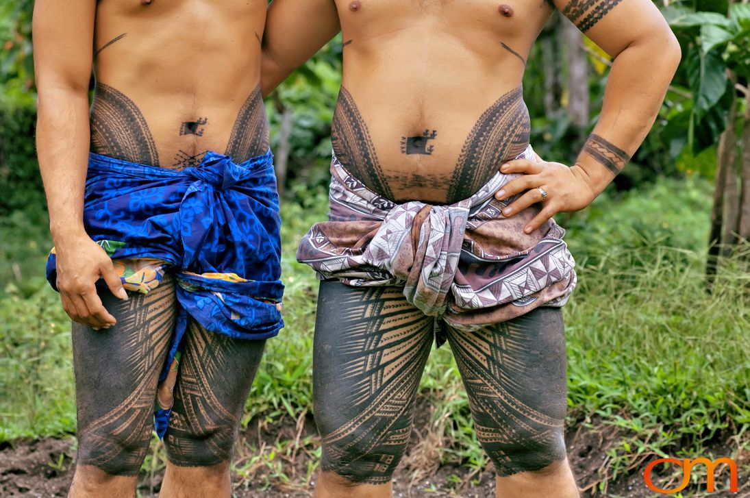 Photo of two men with Samoan Peʻa, traditional male tatau (tattoo). Taken on the island of Savai’i by Amanda Fornal in September 2006.