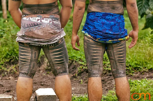 Photo of two men with Samoan Peʻa, traditional male tatau (tattoo). Taken on the island of Savai’i by Amanda Fornal in September 2006.