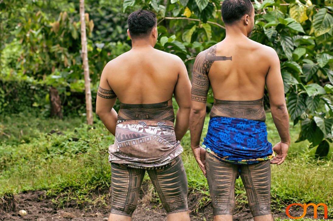 Photo of two men with Samoan Peʻa, traditional male tatau (tattoo). Taken on the island of Savai’i by Amanda Fornal in September 2006.