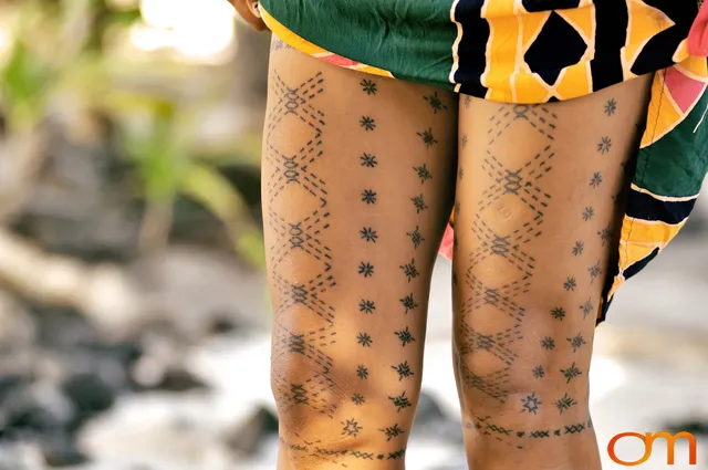 Photo of a woman with traditional Samoan tattoo. Taken of Anastasia on the island of Upolu by Amanda Fornal in September 2006.