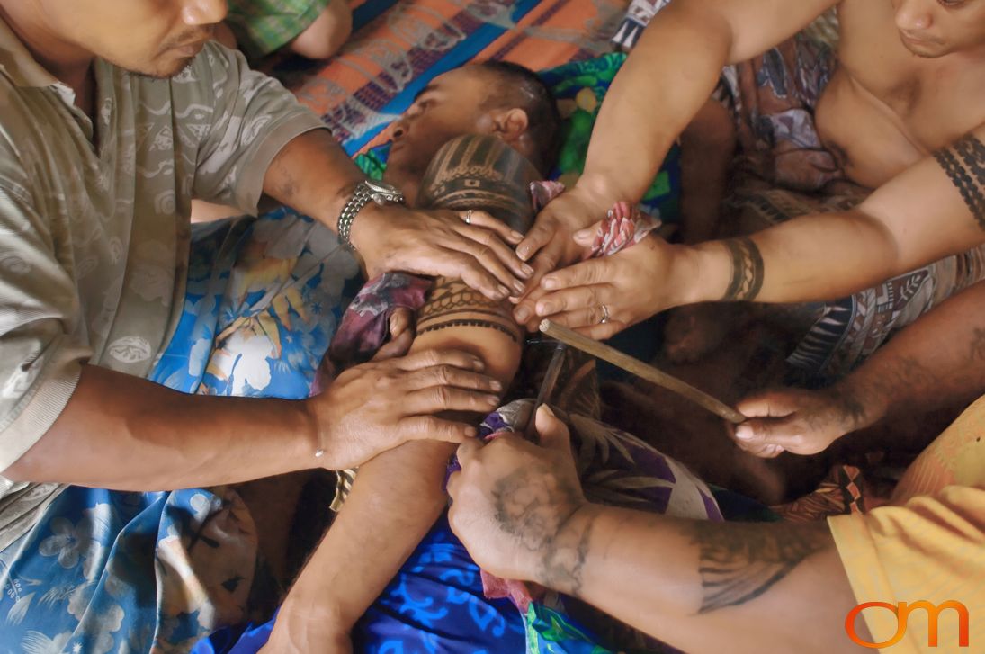 Photo of a man getting a traditional Samoan tattoo. Taken of Chris on the island of Savai’i by Amanda Fornal in September 2006.