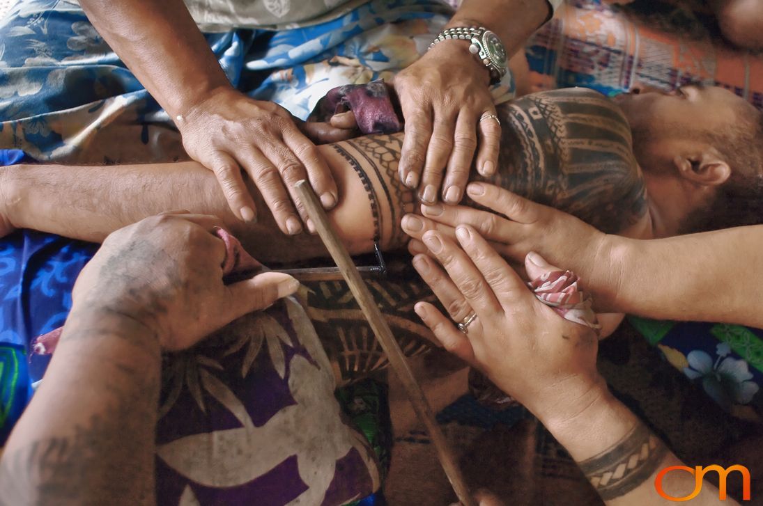 Photo of a man getting a traditional Samoan tattoo. Taken of Chris on the island of Savai’i by Amanda Fornal in September 2006.