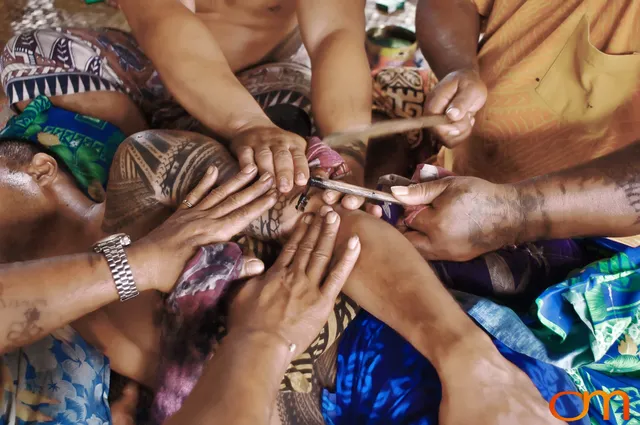 Photo of a man getting a traditional Samoan tattoo. Taken of Chris on the island of Savai’i by Amanda Fornal in September 2006.