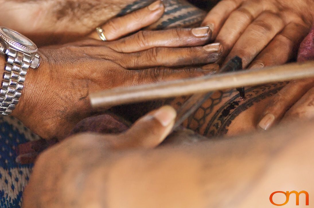 Photo of a man getting a traditional Samoan tattoo. Taken of Chris on the island of Savai’i by Amanda Fornal in September 2006.