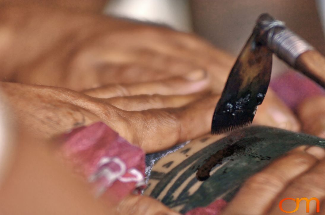 Photo of a man getting a traditional Samoan tattoo. Taken on the island of Savai’i by Amanda Fornal in September 2006.