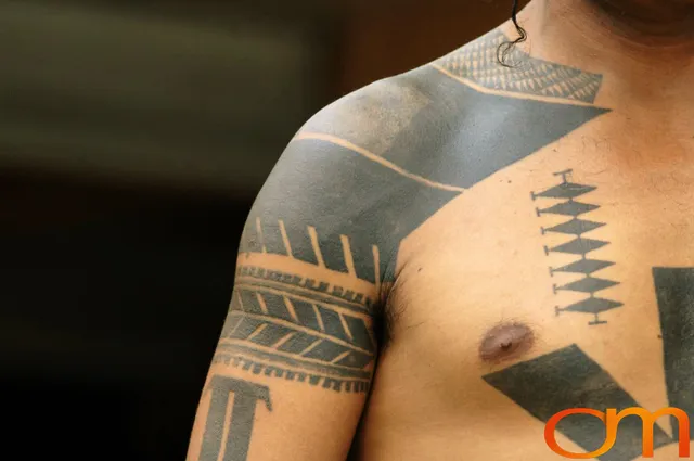 Photo of Solomon Island traditional tattoo on a man's shoulder and chest. Taken on of Francis Tekatoha, a Solomon Islands anthropologist by Amanda Fornal in December 2006.