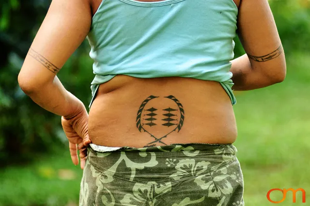 Photo of a woman with Solomon Island traditional tattoos. Taken on the island of Bellona by Amanda Fornal in December 2006.