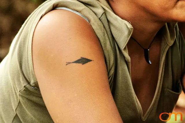 Photo of a woman with Solomon Island traditional tattoos. Taken on the island of Bellona by Amanda Fornal in December 2006.