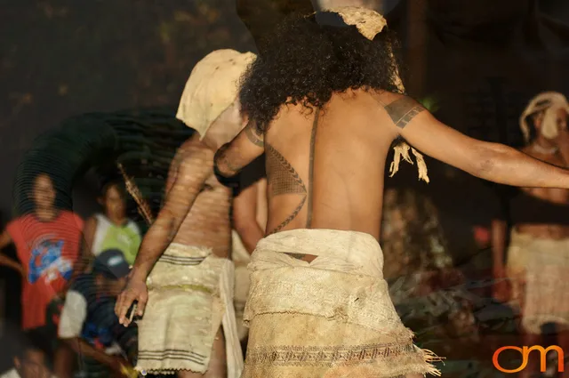 Photo of a man with Solomon Island traditional tattoos doing traditional dance. Taken on the island of Bellona by Amanda Fornal in December 2006.