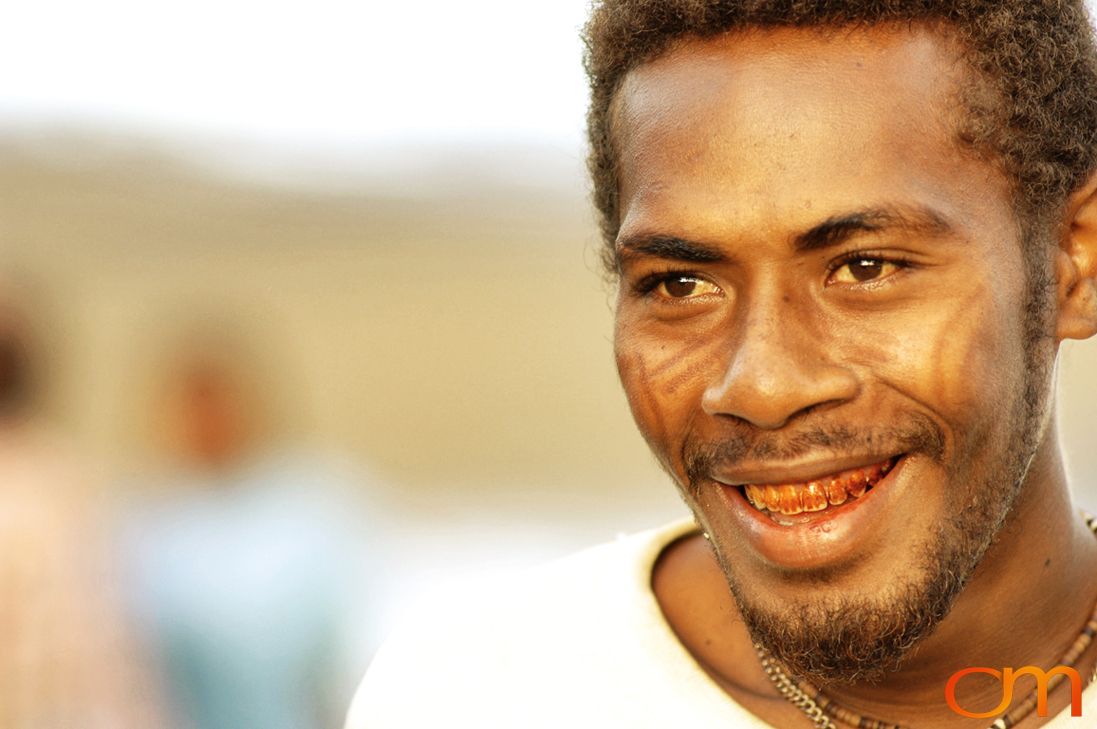 Photo of a man with Solomon Island traditional facial scarification. Taken in the Malaita Province by Amanda Fornal in December 2006.