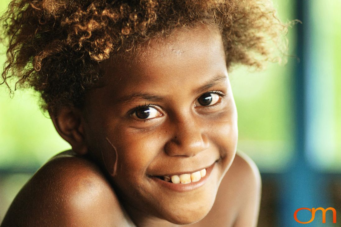 Photo of a girl with Solomon Island traditional facial scarification. Taken of Caroline in the Malaita Province by Amanda Fornal in December 2006.