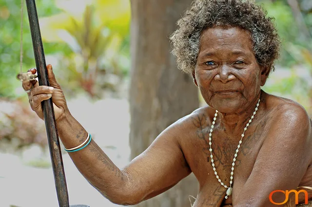 Photo of a woman with Solomon Island traditional tattoos. Taken in the Malaita Province by Amanda Fornal in December 2006.