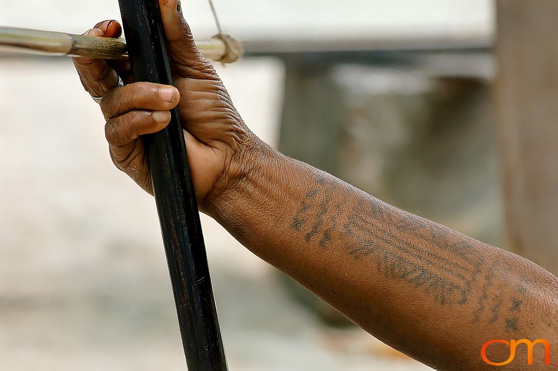 Photo of a woman's arm with Solomon Island traditional tattoos. Taken in the Malaita Province by Amanda Fornal in December 2006.