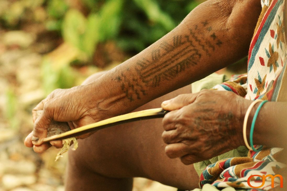 Photo of a woman's arm and hand with Solomon Island traditional tattoos. Taken in the Malaita Province by Amanda Fornal in December 2006.