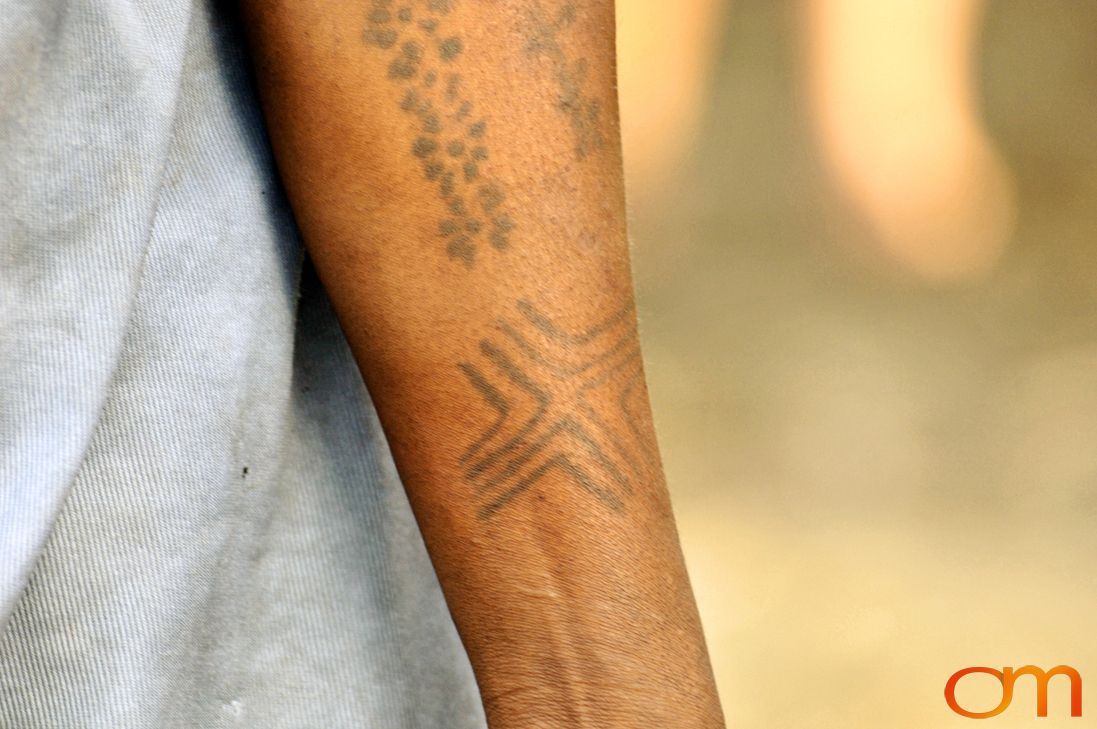 Photo of a woman's arm with Solomon Island traditional tattoos. Taken in the Malaita Province by Amanda Fornal in December 2006.