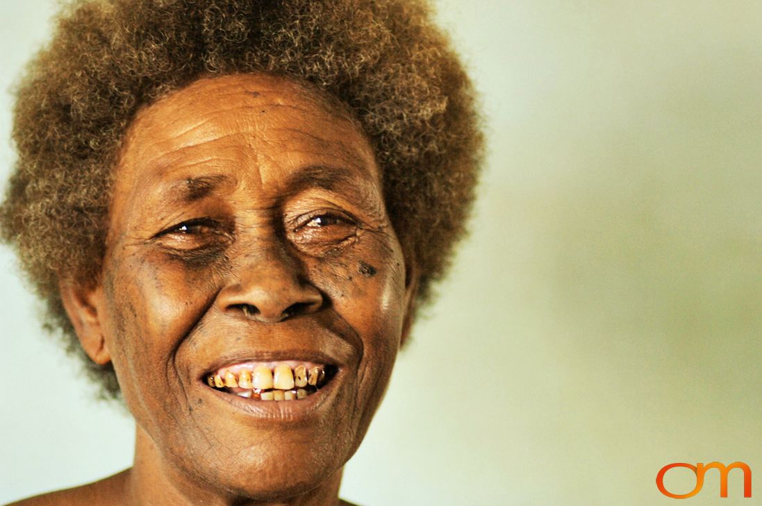 Photo of a woman with Solomon Island traditional face tattoos. Taken in the Malaita Province by Amanda Fornal in December 2006.