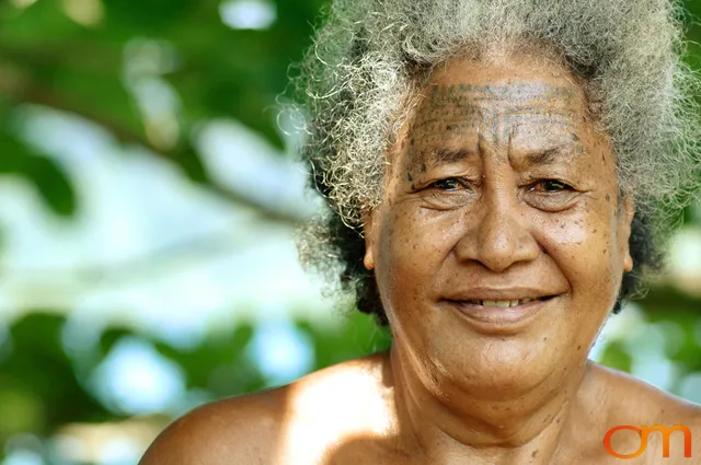 Photo of a woman with Solomon Island Ontong Java traditional face tattoos. Taken by Amanda Fornal in December 2006.