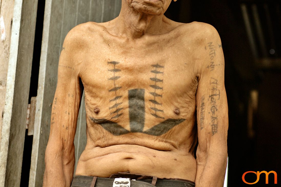 Photo of Solomon Island traditional tattoo on a man's chest. Taken of Timoseus on the island of Rennell by Amanda Fornal in December 2006.