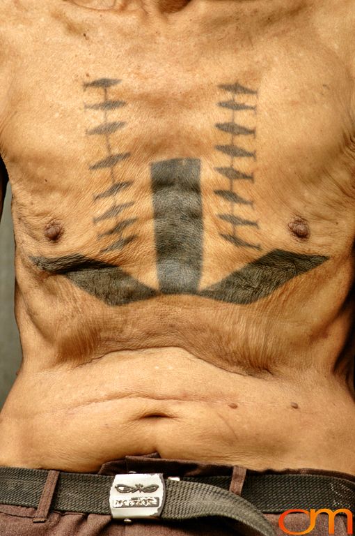 Photo of Solomon Island traditional tattoo on a man's chest. Taken of Timoseus on the island of Rennell by Amanda Fornal in December 2006.