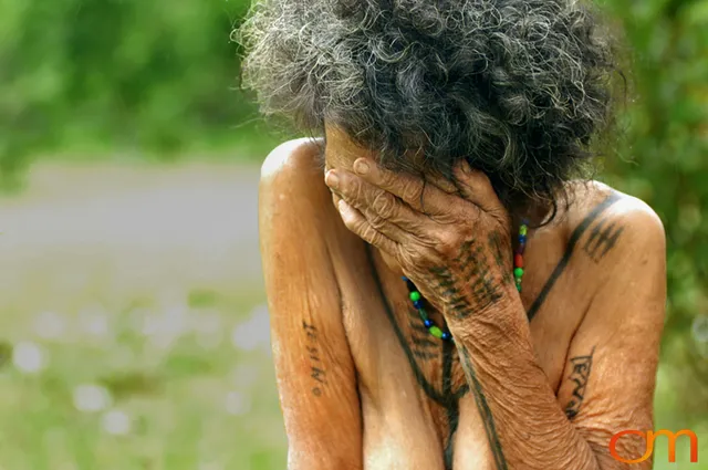 Photo of a woman with Solomon Island traditional tattoos. Taken on the island of Rennell by Amanda Fornal in December 2006.