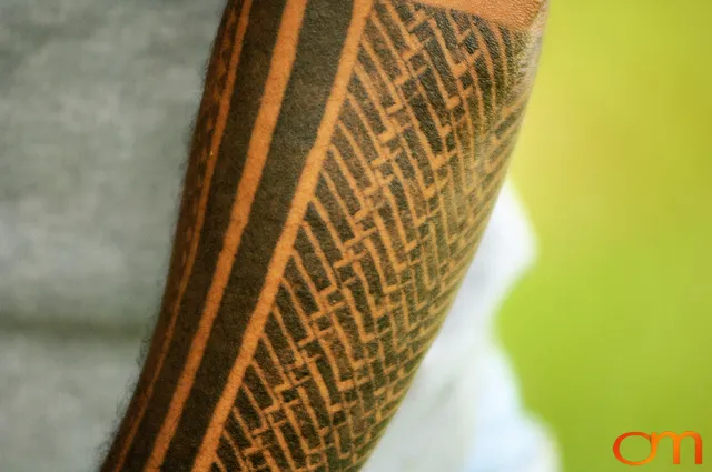 Photo of Solomon Island traditional tattoo on a man's arm. Taken of Wes on the island of Rennell by Amanda Fornal in December 2006.