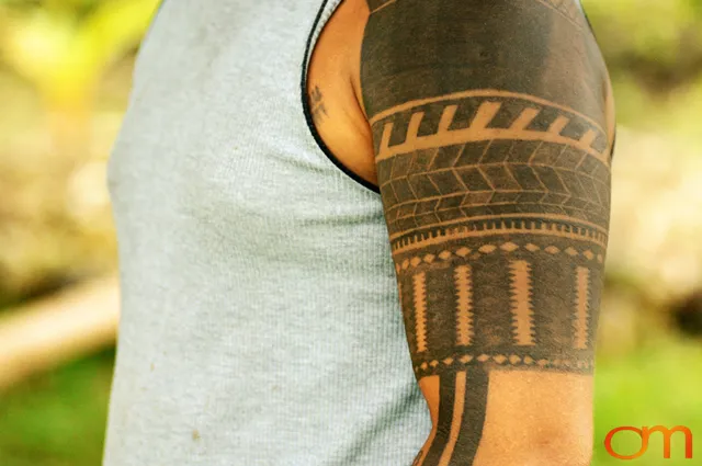 Photo of Solomon Island traditional tattoo on a man's shoulder. Taken of Wes on the island of Rennell by Amanda Fornal in December 2006.