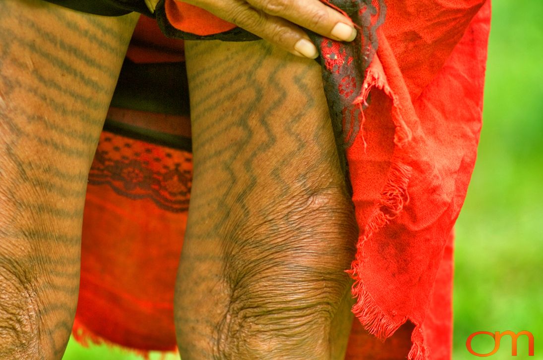 Photo of Vanuatu woman with a traditional tattoo on her legs. Taken of Julliet on the Vanuatu Island of Ambae by Amanda Fornal in December 2006.