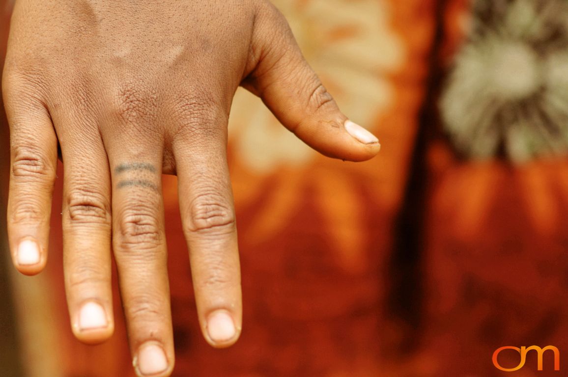 Photo of Vanuatu woman with a traditional tattoo on her hand. Taken of Kenna on the Vanuatu Island of Ambae by Amanda Fornal in December 2006.