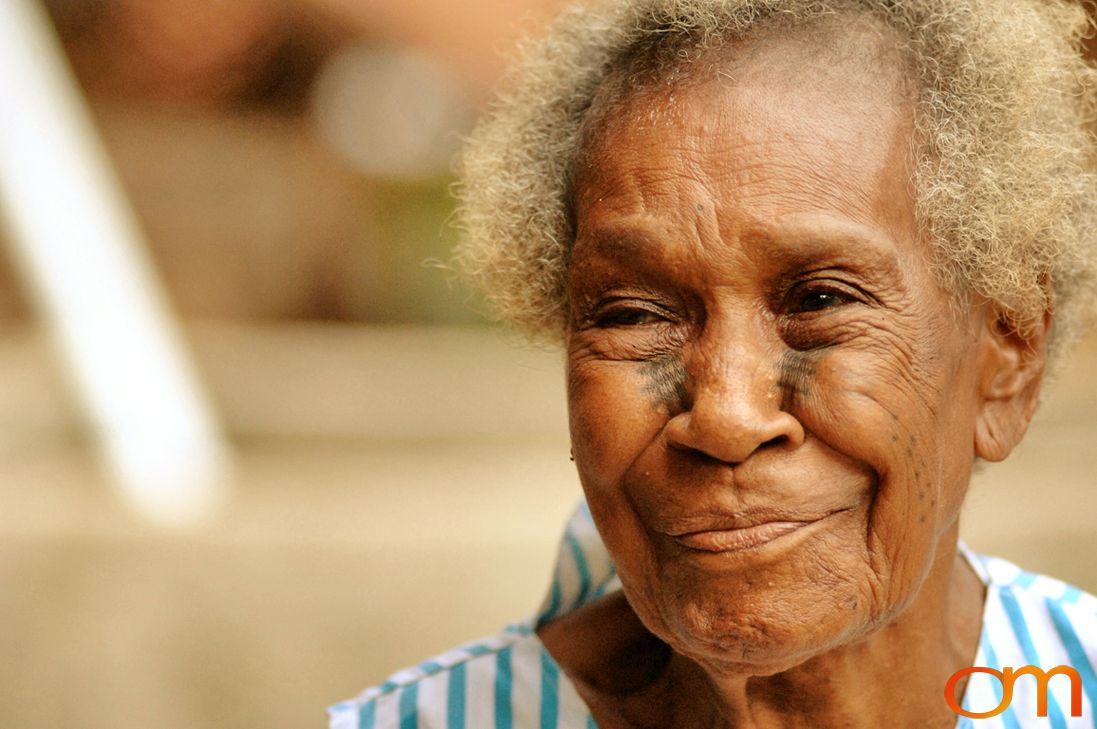 Photo of Vanuatu woman with a traditional tattoo on her face. Taken of Sarah on the Vanuatu Island of Mota Lava by Amanda Fornal in December 2006.